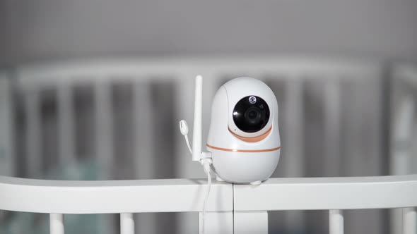 The Baby Monitor Camera with the Rotation Function Monitors the Child in...