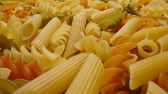 National Cuisine Concept. Closeup of Uncooked Italian Pasta