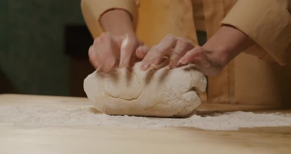 Kneading Dough for Pizza with Hands Flour Baking Pastry at Home