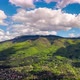 Time Lapse of a Mountain with Fluffy Clouds - VideoHive Item for Sale