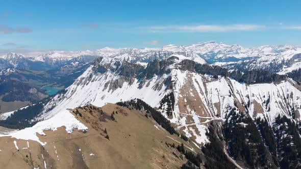 Aerial Drone View on Snowy Peaks of Swiss Alps. Switzerland. Rochers-de-Naye Mountain Peak