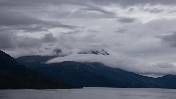 Time Lapse, View of Scenic Lake and Mountain on a Cloudy Fall Morning, Yukon, Canada