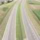 View from the drone on the highway near the village, 4k drone. - VideoHive Item for Sale