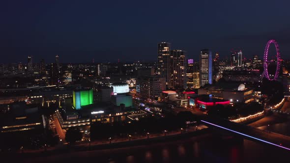 Slide and Pan Footage of Colourful Buildings on Thames River South Bank