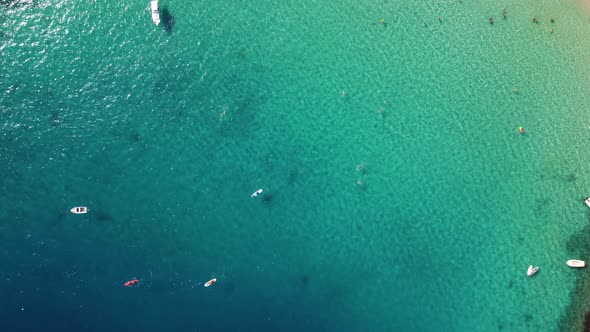 Top Down View Of Turquoise Ocean At Prapratno Beach, Pelješac Peninsula, Croatia - aerial drone shot