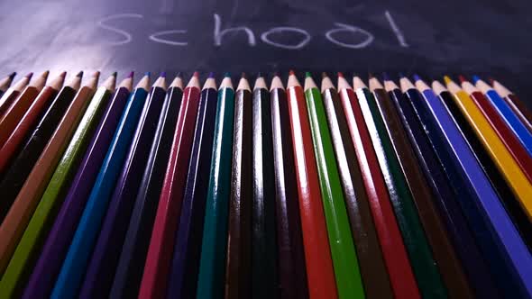 Colorful Pencils And School Word On Board 2