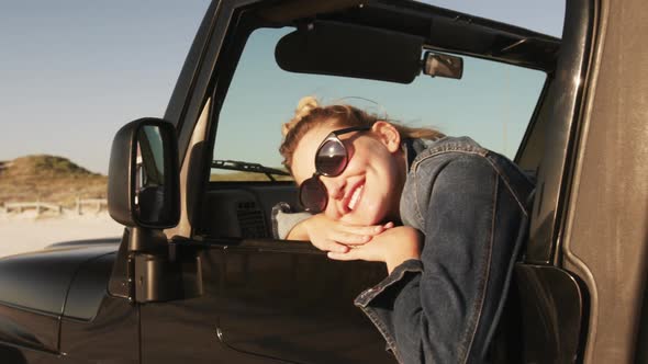 Woman enjoying free time during road trip