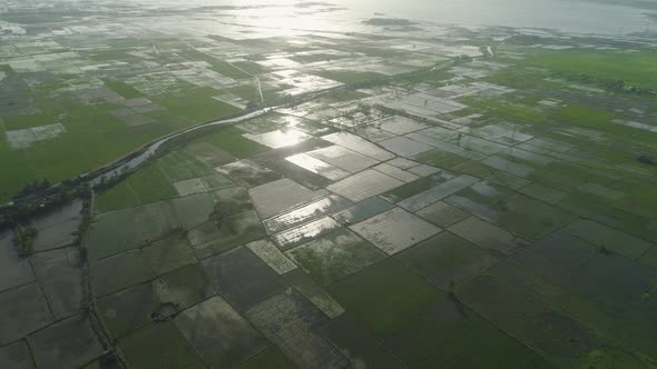 Landscape with Lake, Farm Lands and Mountains