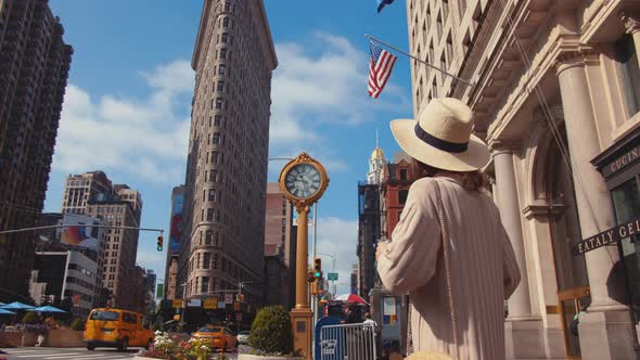 Young girl with a retro camera in New York