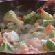 Frozen Vegetables are Cooked in a Frying Pan Highlighting Steam - VideoHive Item for Sale