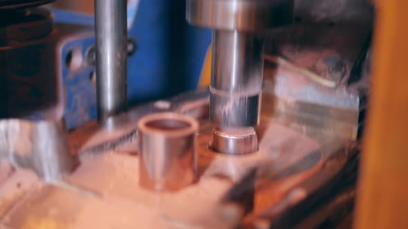 Conveyor Mechanism is Carving Copper Pieces Out