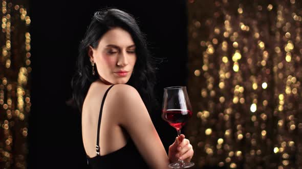 Adorable Mixed Race Lady Posing Red Wine Glass at Fashion Night Party