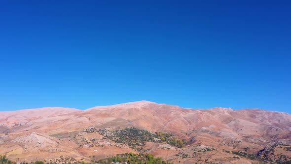 Aerial View of Beautiful Clear Sky Over Mountain Slopes