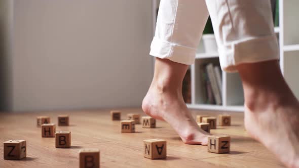 Women's Legs Take Steps On A Wooden Floor, Movement Of Legs Through Obstacles, Shugi