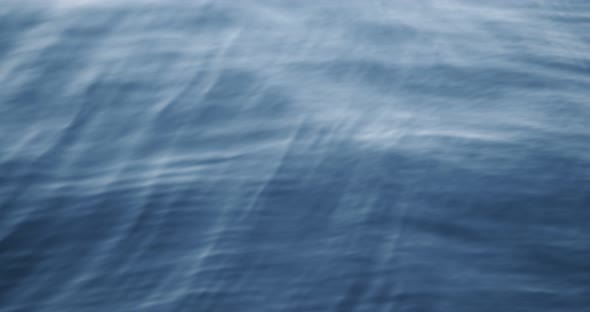 Background Image of a Small Wave Blue Sea