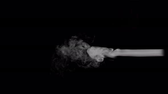Super Slow Motion Shot of Rising Smoke Isolated on Black Background at 1000 Fps