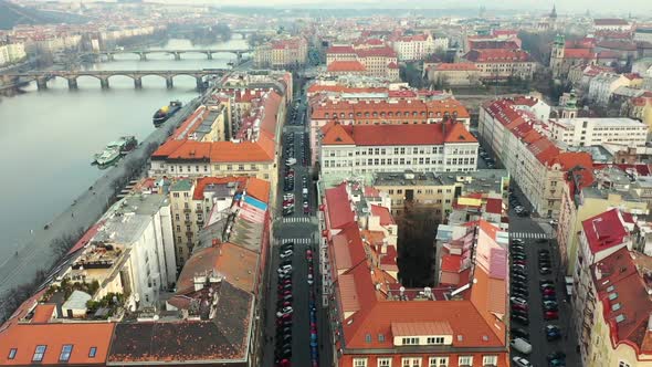 Prague, Czech Republic. Aerial View of Downtown Buildings and Bridges on Vltava River on Misty Morni