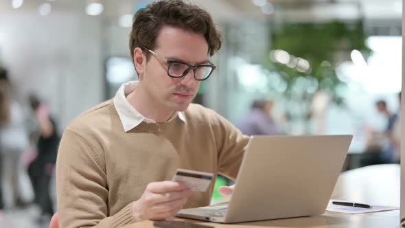 Online Shopping Failure on Laptop By Creative Young Man