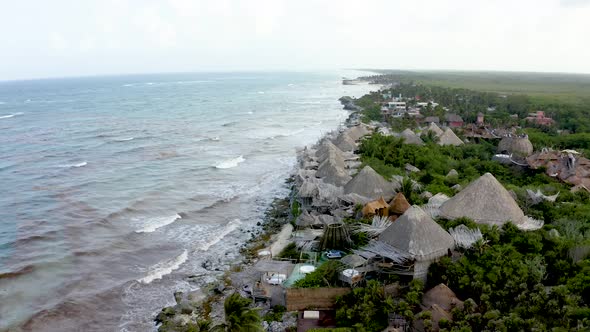 Beautiful Aerial View of the Eco Wooden Houses in the Middle of a Jungle