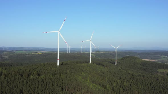 Aerial view of wind turbines in forest, Franconia, Bavaria, Germany