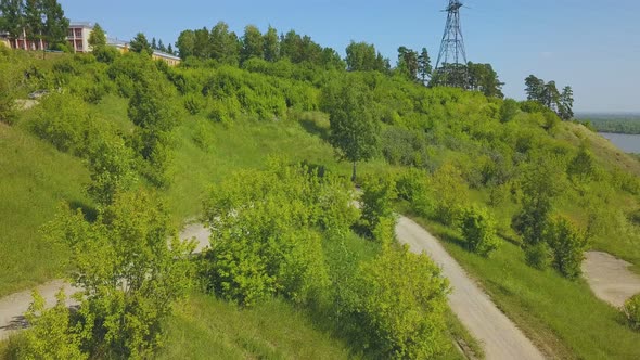 Just Married Couple on Hairpin Curves on Hill Bird Eye View