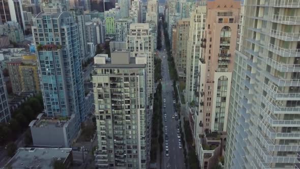 Drone Rising Over Buildings in Vancouver, Canada. Urban Footage of Vancouver