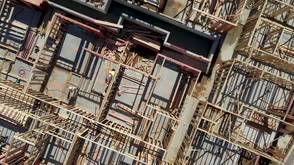 Aerial View of a New Building Being Framed By Carpenters