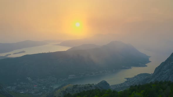 Sunset with Fog View of Kotor Bay and Mountains in Montenegro