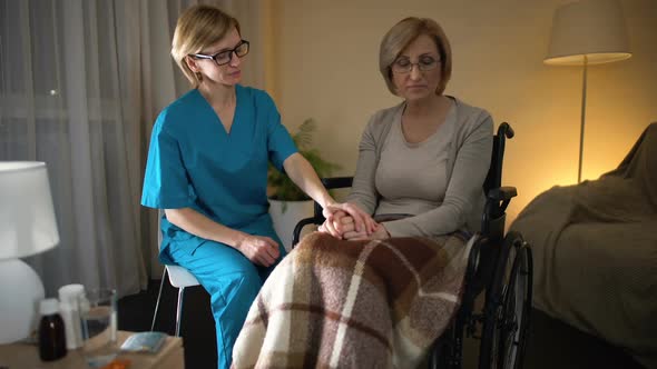 Medical Worker Holding Female Patient Hand, Nurse Service, Support and Care