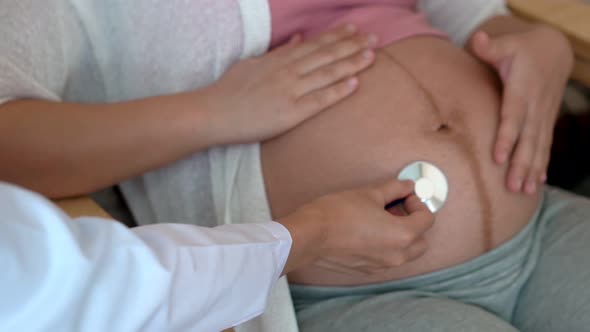 Pregnant Woman and Gynecologist Doctor at Hospital