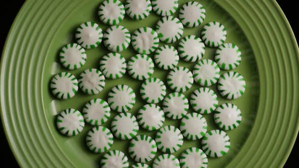Rotating shot of spearmint hard candies - CANDY SPEARMINT 020