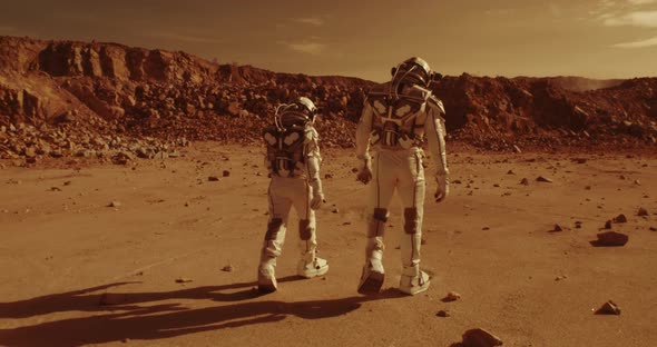 Unrecognizable Astronauts Walking on Mars