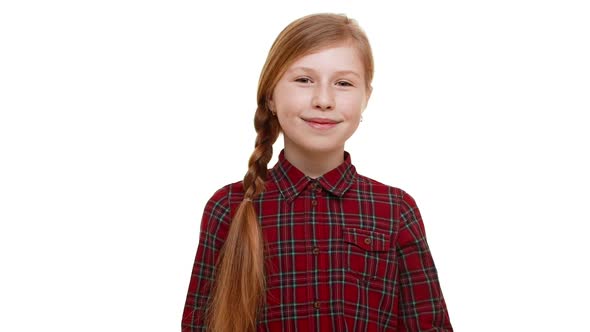 Lovely Elementaryschool Aged Girl with Light Brown Plait of Hair Standing on White Background and