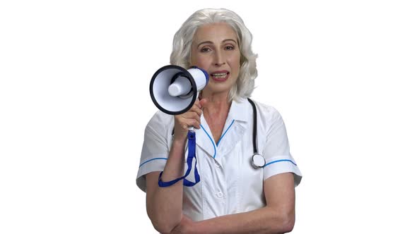 Portrait of Senior Friendly Doctor Talking Into Megaphone