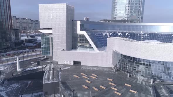 Aerial view of modern glass facade buildings in Ekaterinburg city, Russia, winter, sunny day 08