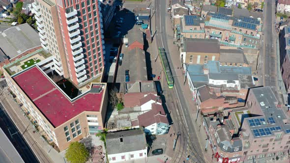 Overhead aerial drone shot from London tram on tamworth road to Croydon town centre