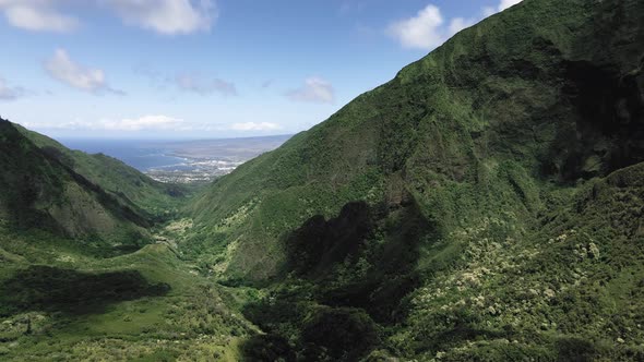 Aerial footage of the mountain and panorama of Kahului, Maui, Hawaii, USA