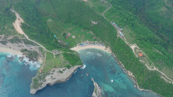 Aerial View of Tropical Island Washed By Ocean Atuh Beach