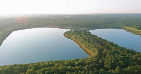 Panoramic View of Landscape with Morning Fog Over the Lake Near the Forest