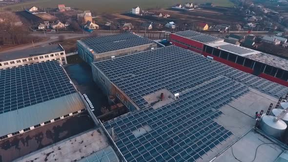 Solar farm on roofs of industrial buildings.