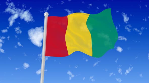 Guinea Flag Waving In The Sky With Cloud alt