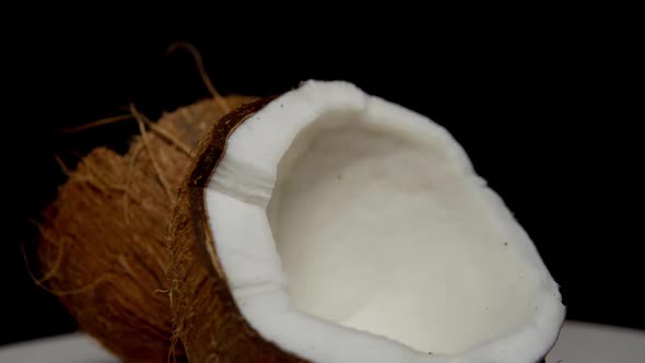 Two Halves of Coconut with White Pulp Inside
