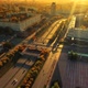 A Beautiful Surreal Aerial Flight Over the City and Highway Bridge at Sunrise on a Summer Morning - VideoHive Item for Sale