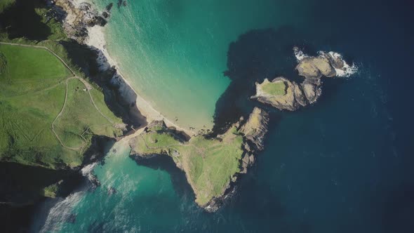 Ireland Island Top Down Aerial View. Majestic Greenery Landscape of Carrick-a-Rede Bridge