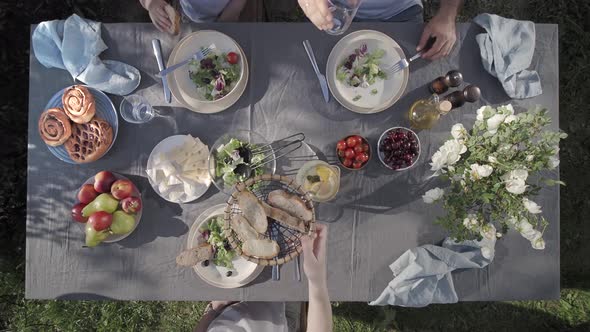 Family Dinner Outdoors Top View Staycation