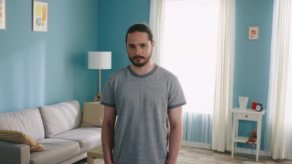 Confident Man Portrait Standing at Home