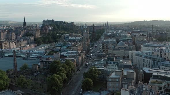 Descending drone shot of Edinburgh to reveal Dugald stewart monument Calton hill view point