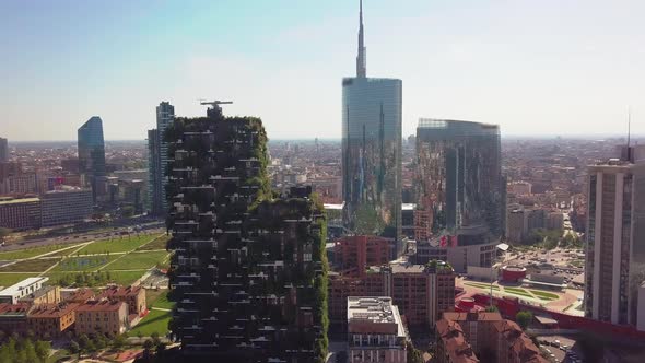 Aerial View. Modern and Ecologic Skyscrapers with Many Trees on Every Balcony