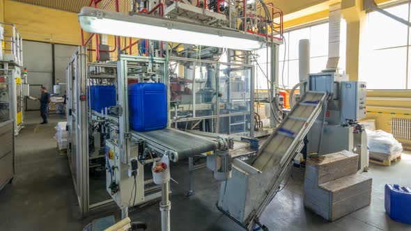 A Factory for Plastic Canister Production Timelapse Hyperlapse. The Conveyor in the Factory.