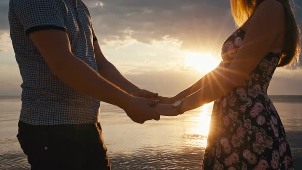 Date of a Couple in Love at Sunset